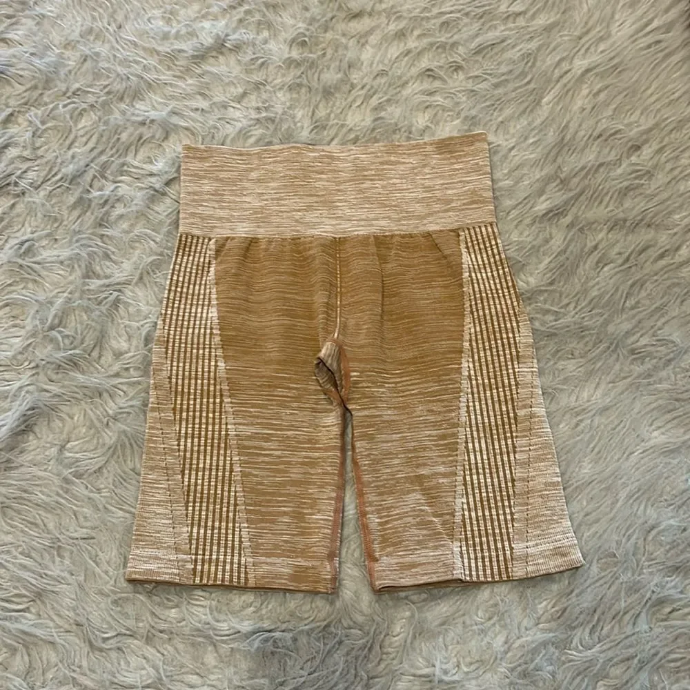 Ryka women’s light brown stretch biker shorts‎ size small